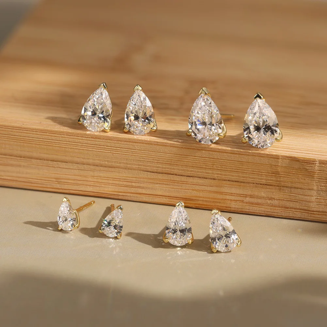 Éclat™ Pear Cut Moissanite Earrings
